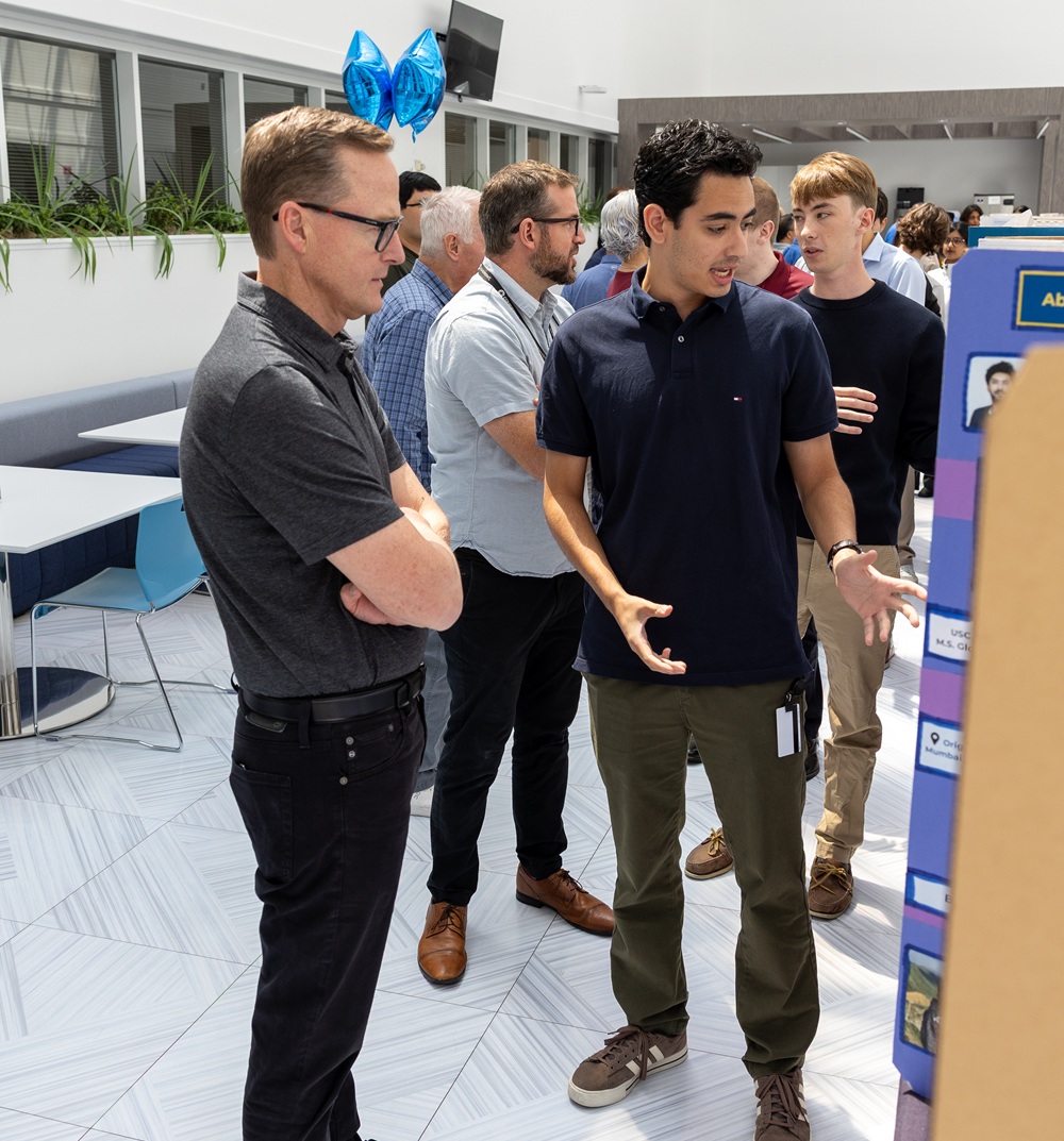 The future of Coherent starts with moments like this. CEO, Jim Anderson with one of our summer interns.